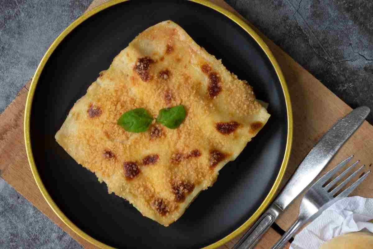 Lasagna funghi, prosciutto e mozzarella